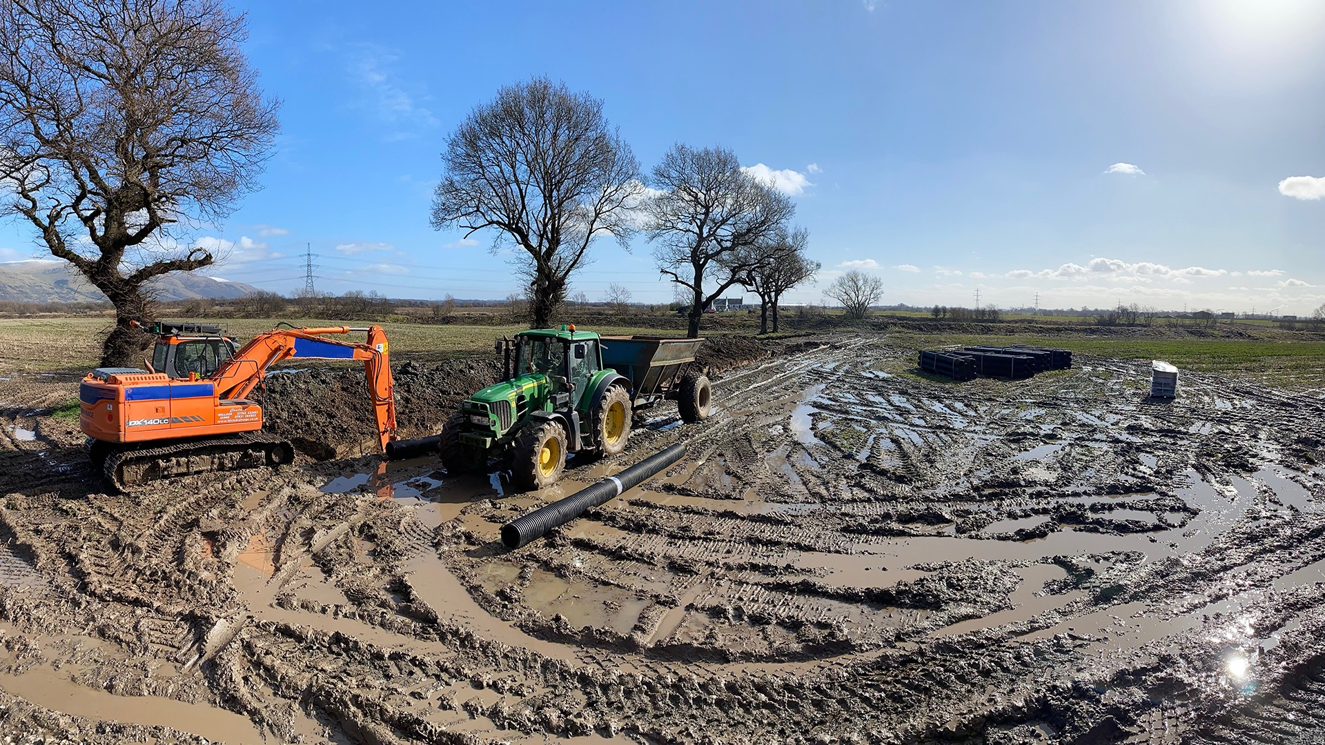 Renewal of leader drains on farmland with  twin-wall pipe and gravel backfill