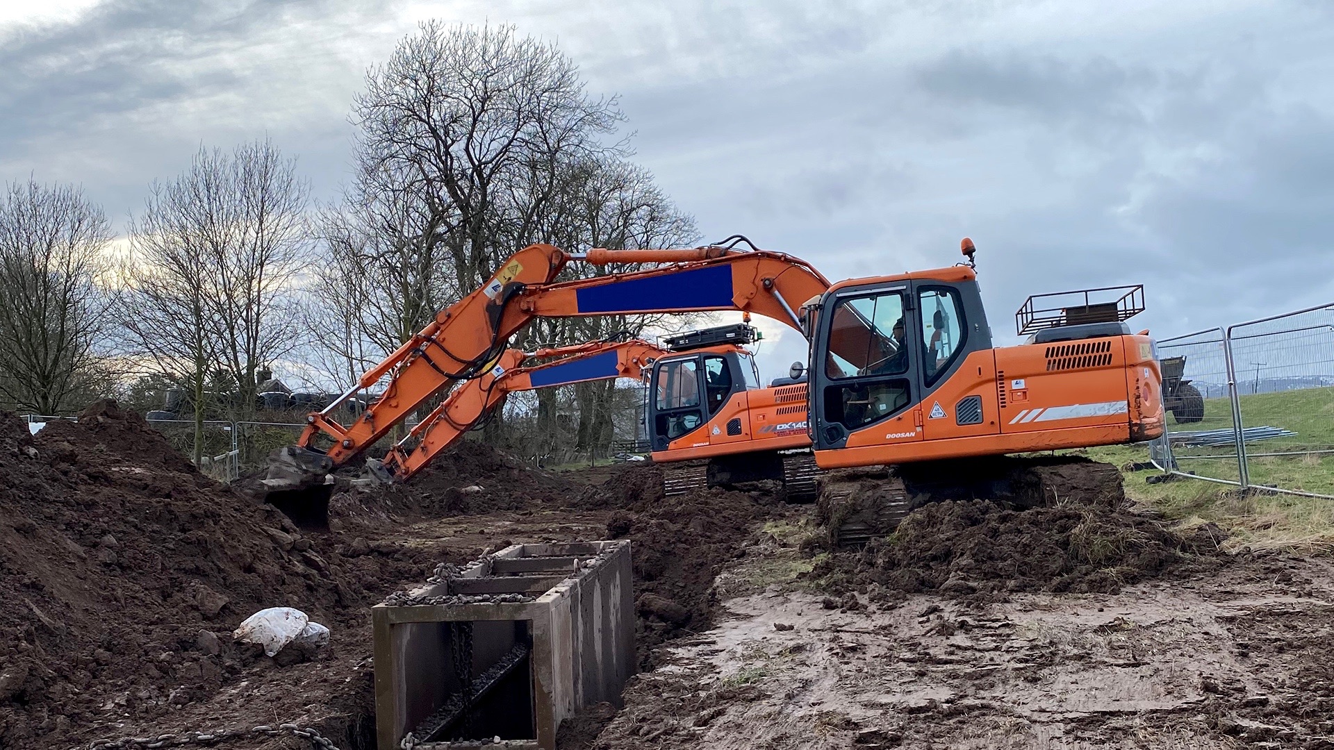 Deep drainage excavations with shored up excavations for safe working